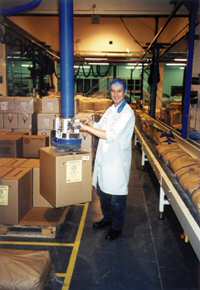 Combination sack and box lifter shown here lifting boxes in the Food