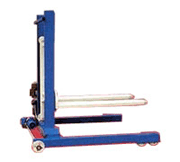A special type of custom made table lift with powered wheels for use on rails.