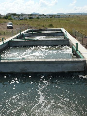 Concrete housed sewage treatment systems